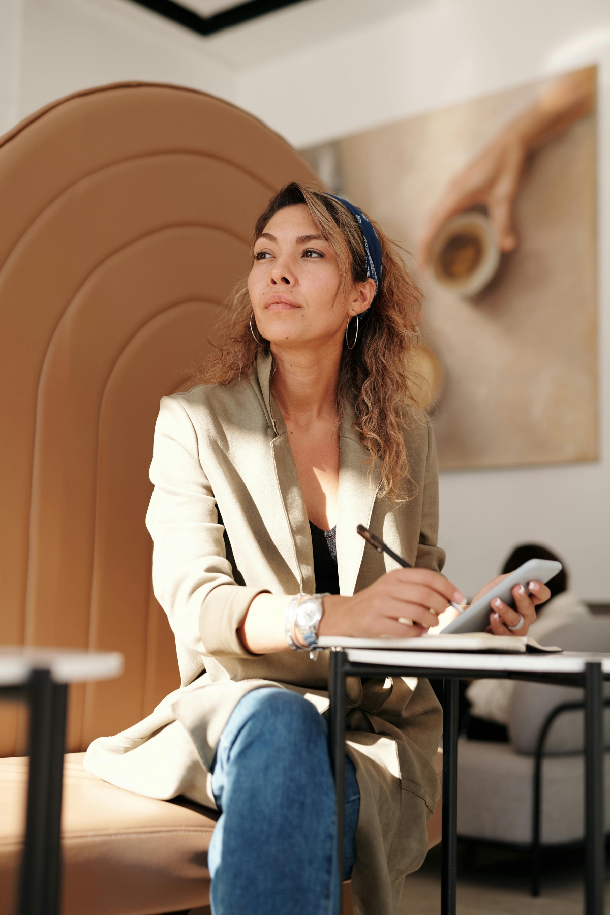 woman thinking while doing work